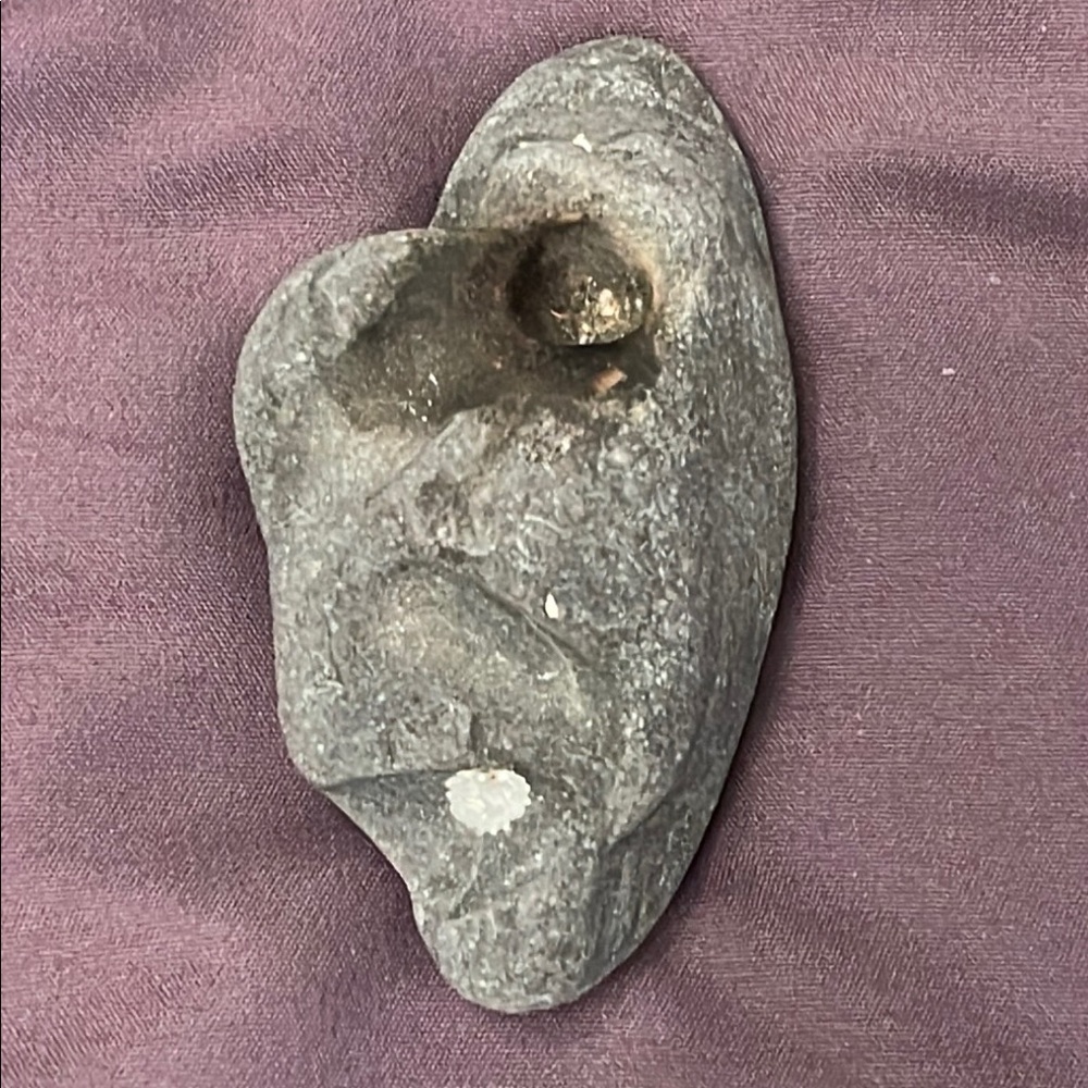 What Story Could This Unique Gray Stone Tell?